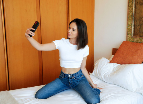 Eve Sweet takes selfies with big tits out before stripping jeans - 3 of 12