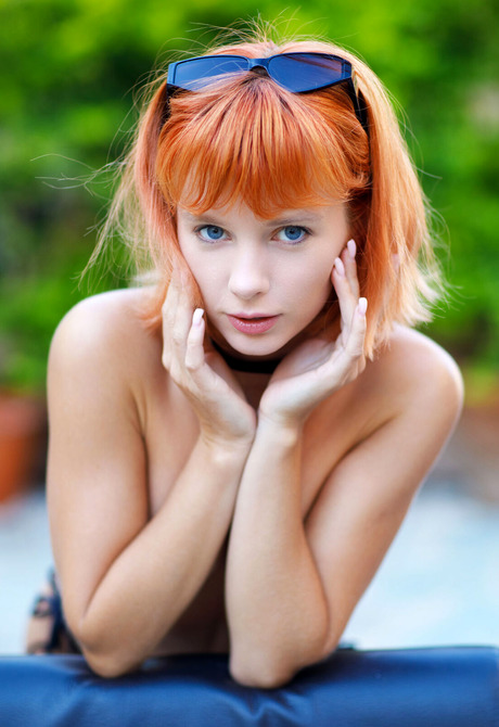 Hot redhead teen Marta Gromova removes bikini nad poses naked in high heels