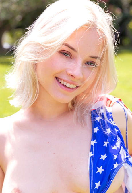 Busty blonde cutie Bianca Bell teasing in patriotic bikini - 12 of 12