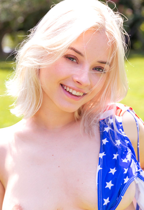 Busty blonde cutie Bianca Bell teasing in patriotic bikini