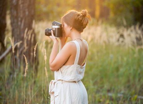 Brunette photographer Aristeia takes nudes outdoors after stripping - 1 of 16