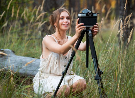 Brunette photographer Aristeia takes nudes outdoors after stripping - 2 of 16