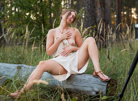 Brunette photographer Aristeia takes nudes outdoors after stripping - 4 of 16