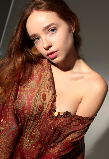 Beautiful redhead model Rinna Ly showing perky tits in art nudes