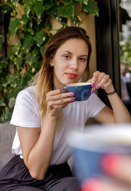 Brunette with perky tits spreads legs to reveal shaved pussy in bedroom - 2 of 12