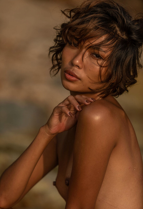 Hourglass-shaped Rosah poses naked at beach after stripping bikini - 12 of 16