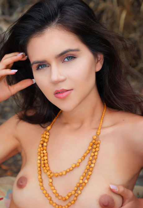 Small breasted brunette Vanessa Shy teasing naked outdoors in nature - 10 of 12