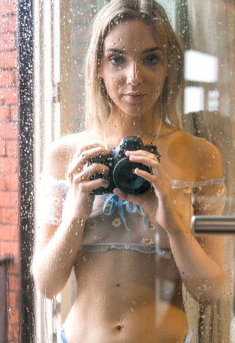 Oxana Chic teasing with camera in sheer lingerie flaunting tan lines - 3 of 12