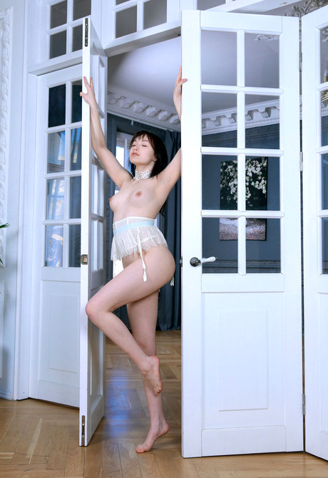 Stunner Leona Lace reveals big tits and shaved pussy during fantastic teasing session