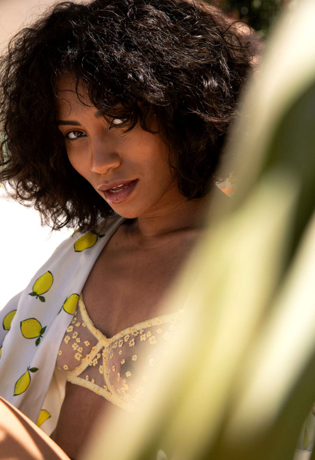 Sexy exotic beauty Fatima peeling off bra and panties in outdoor nudes - 4 of 16