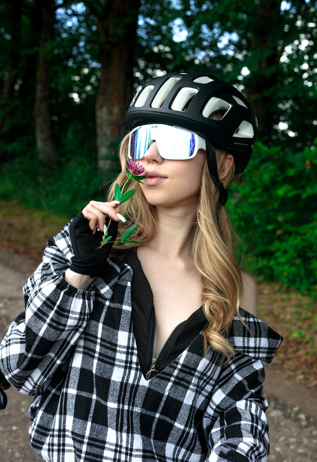 Join blonde teen babe Mirka on bicycle ride outdoors where she strips all clothes off - 2 of 12