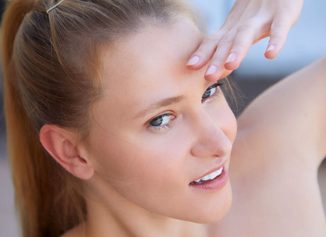 Slender small tits babe Ivi Rein teasing naked outdoors on patio - 12 of 16