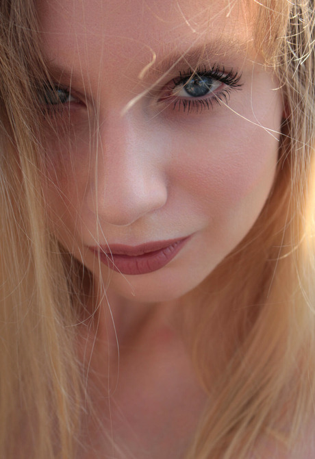 Busty blonde Annie Anne strips off bikini and poses in erotic nudes - 6 of 16