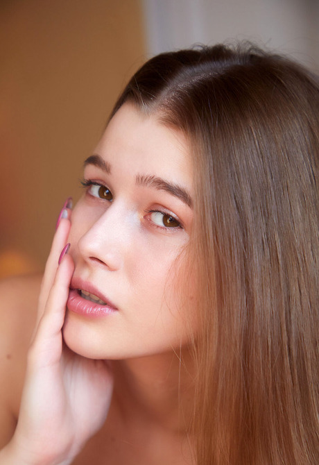 Stunning teen Olivia Sparkle wears high heels during seductive teasing