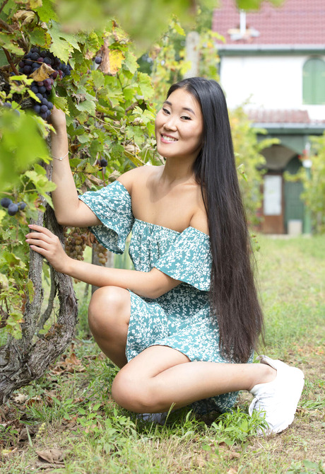 Asian beauty Katana taking off dress and sharing small tits outdoors