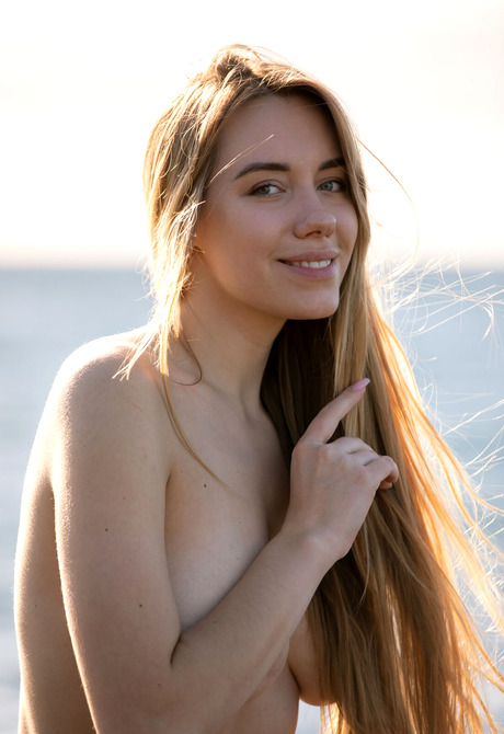 Gorgeous busty babe Ryana teasing near the beach in her bikini - 15 of 16