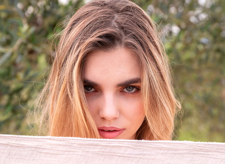 Beautiful nude model Annette sensually stripping and posing outdoors - 7 of 16