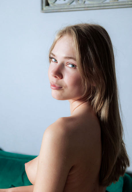 Blonde babe Luise makes you wish you are the couch she flaunts skinny naked body on - 2 of 16