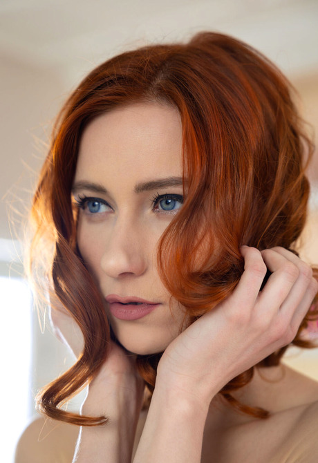 Small tits redhead Rona Talin trying on outfits in dressing room - 15 of 16