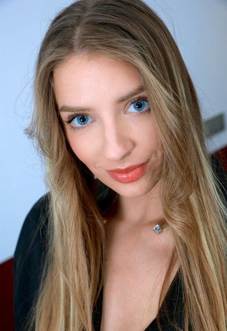 Naughty blonde in heels Brittany Bare strips to reveal small tits and shaved pussy - 3 of 16