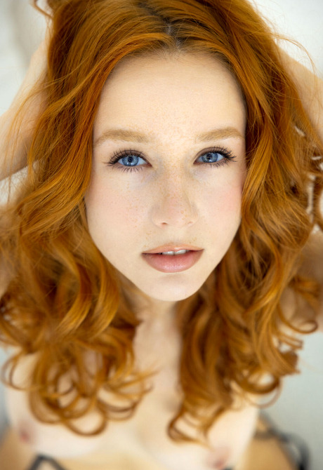 Stunning redhead teen Lila Rouge looks better than ever in black stockings and lingerie - 16 of 16