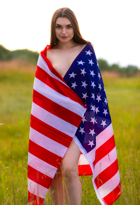 Brunette babe Monika May celebrates 4th of July with USA Flag with perky tits out - 2 of 12