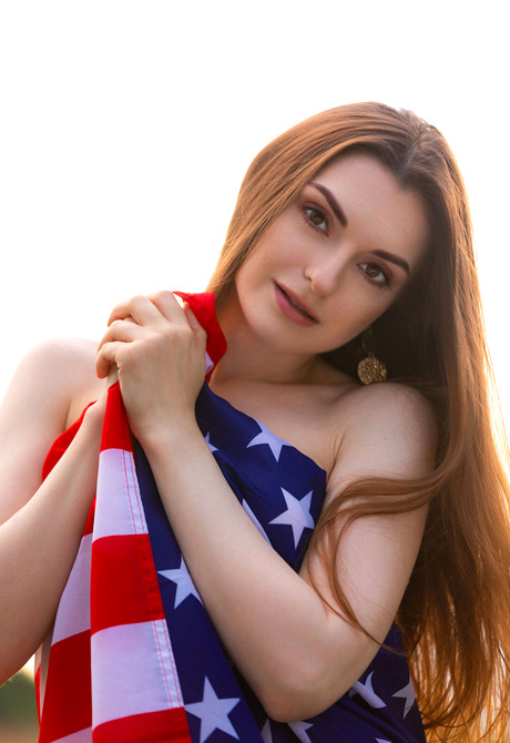 Brunette babe Monika May celebrates 4th of July with USA Flag with perky tits out - 8 of 12