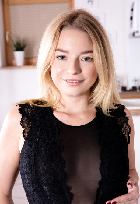 Blonde beauty Jude strips top to reveal perky tits before feet and shaved pussy teasing - 3 of 12