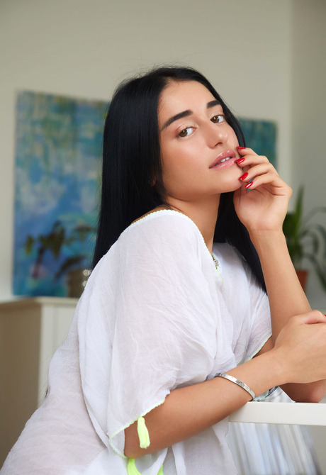 Black hair babe Ara Mix relaxes by stripping off white dress and spreading legs - 2 of 16