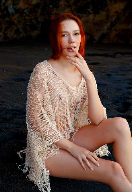 Small breasted redhead model Janey teasing in outdoor beach nudes - 8 of 16
